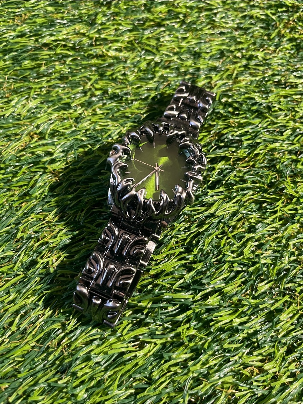 Black Sculpted Metal Wrist Watch with Green Dial